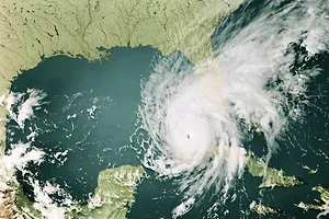 AN AERIAL VIEW OF A TIGHTLY SWIRLING CLOUD SYSTEM OVER FLORIDA