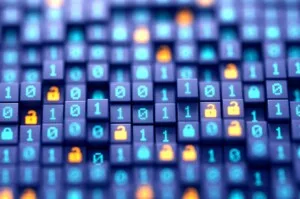 A MOSAIC OF LITTLE BUTTONS LABELED WITH NOUGHTS AND ZEROES, INTERSPERSED WITH ONES BEARING A SECURITY ALERT SYMBOL