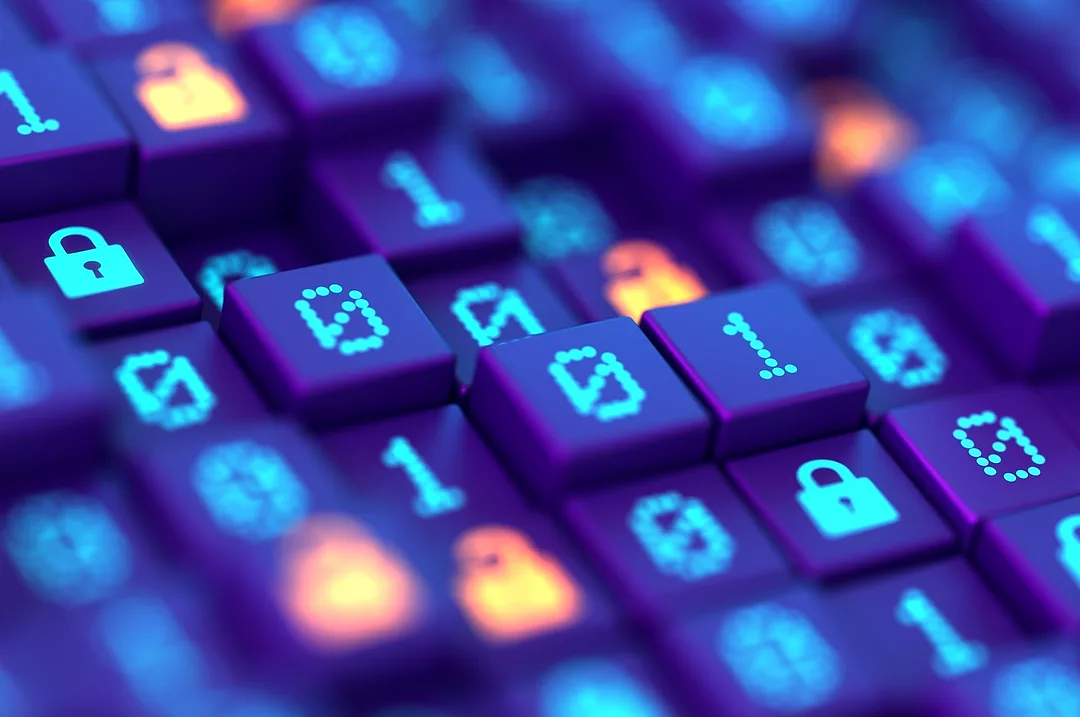 A CLUSTER OF LIGHTED KEYBOARD KEYS BEAR SYMBOLS ONE AND ZERO AND A PADLOCK