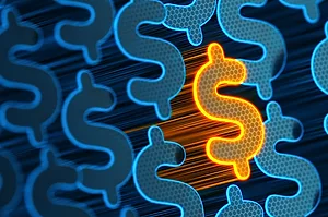 A BRIGHT ORANGE DOLLAR SIGN FLOATS AMONGST DARKER BLUE DOLLAR SIGNS