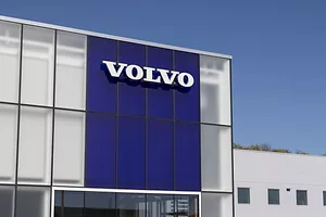 A CAR DEALERSHIP BEARS THE VOLVO LOGO
