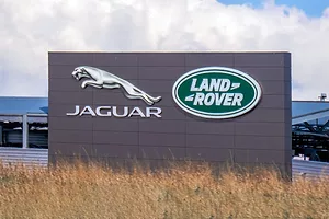 A DISPLAY OUTSIDE A FACTORY DISPLAYS THE JAGUAR LAND ROVER INSIGNIA