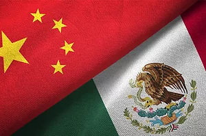 THE FLAGS OF MEXICO AND CHINA ARE FOLDED TOGETHER