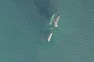 AN AERIAL SHOT OF SHIPS AT SEA