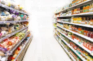 BLURRED PHOTO OF SUPERMARKET SHELVES