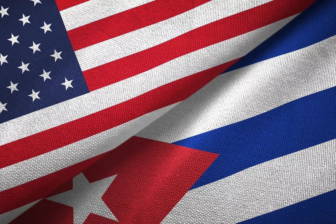 The U.S. and Cuban flags juxtaposed against each other