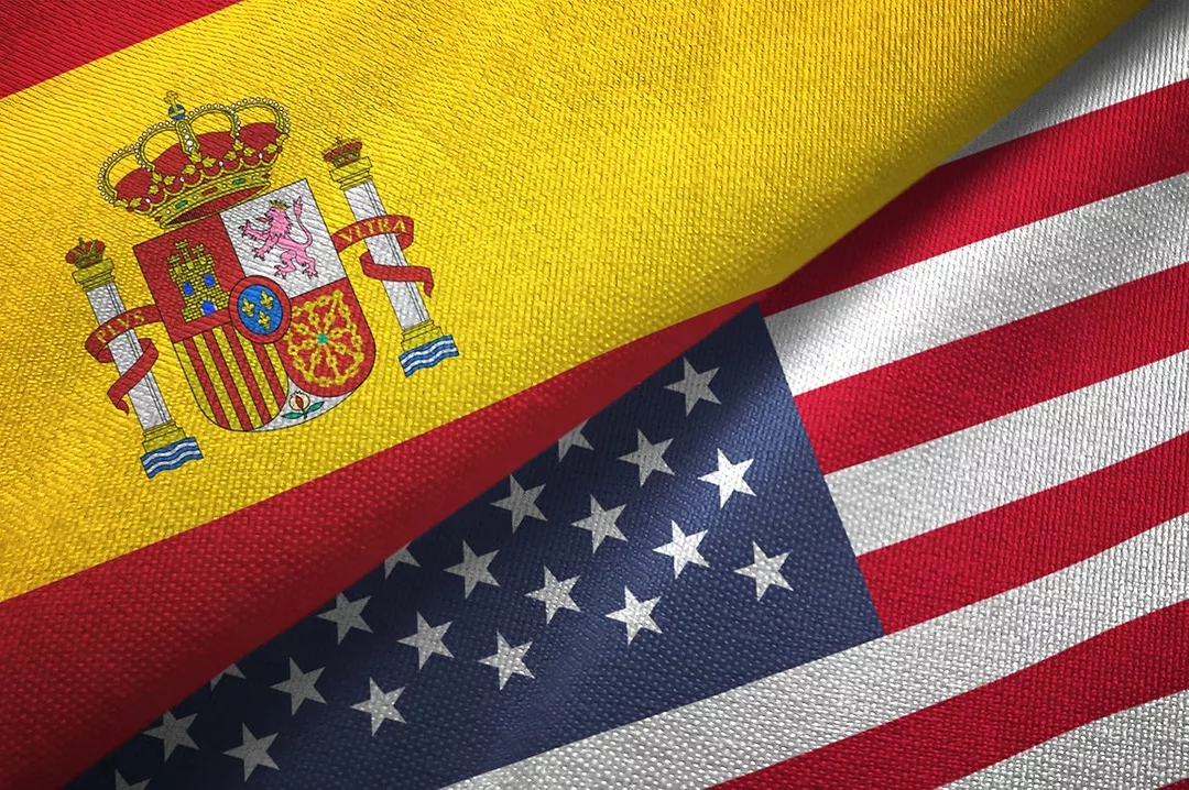 THE FLAGS OF SPAIN AND THE US ARE FOLDED SIDE BY SIDE