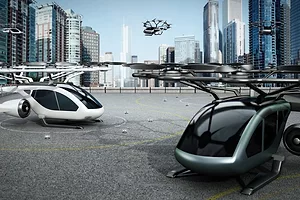 Artist's concept of eVTOL (electric vertical take-off and landing) aircrafts as a taxi/shuttle service at the helipad on top of a building