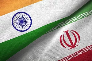 THE FLAGS OF INDIA AND IRAN ARE FOLDED SIDE BY SIDE