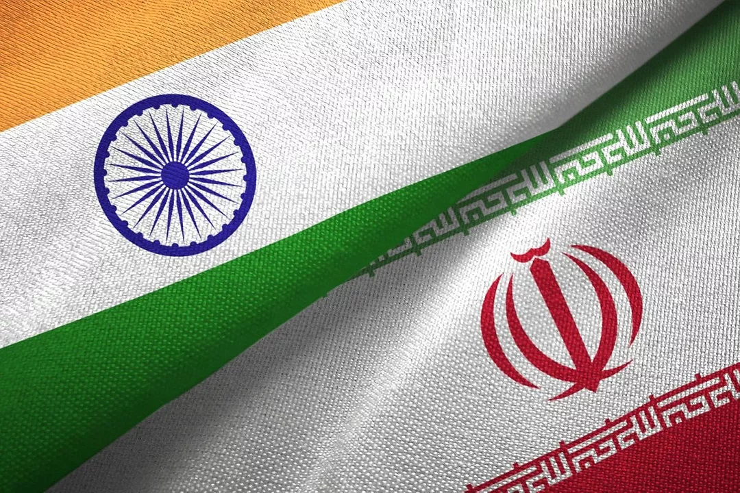 THE FLAGS OF INDIA AND IRAN ARE FOLDED SIDE BY SIDE