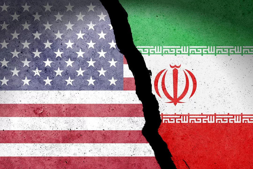 Flag of USA and Iran painted on a concrete wall