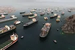 tankers and container cargo ships clustered in aerial 3D illustration render. 