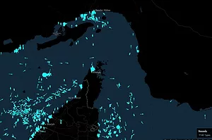 A MAP OF THE STRAIT OF HORMUZ IN BLACK SHOWS MANY BRIGHT BLUE DOTS REPRESENTING SHIPS