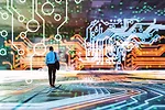 artificial-intelligence-jobs-iStock-1485546309.jpg A man in a business suit with a shoulder bag walking inside a depiction of the inside of a computer