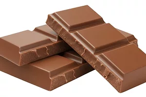 Pieces of a chocolate bar stacked on top of each other