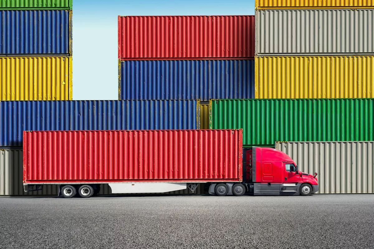 Semi truck trucking port istock 2268304198
