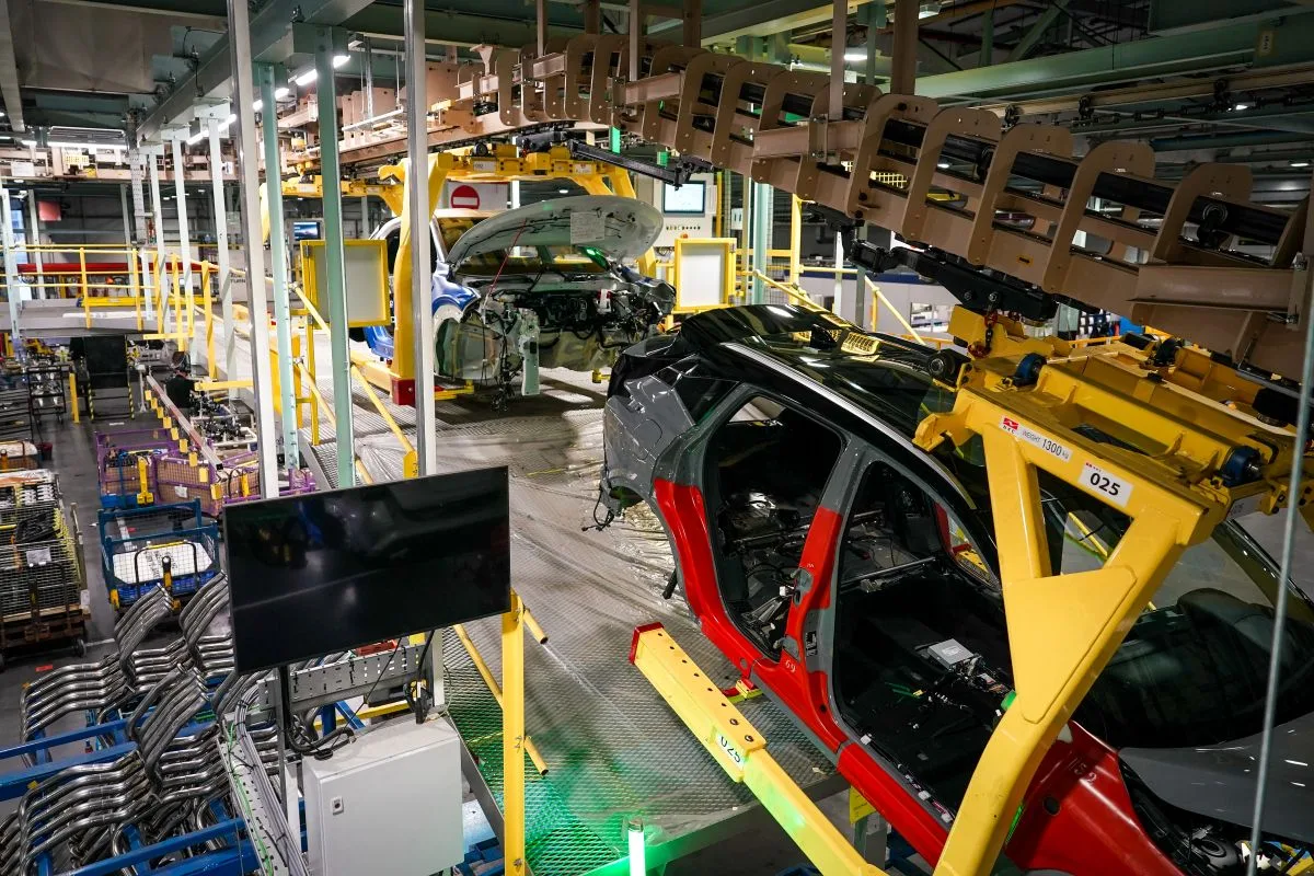 THE COMPLEX INTERIOR OF AN AUTO MANUFACTURING PLANT