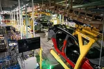 THE COMPLEX INTERIOR OF AN AUTO MANUFACTURING PLANT