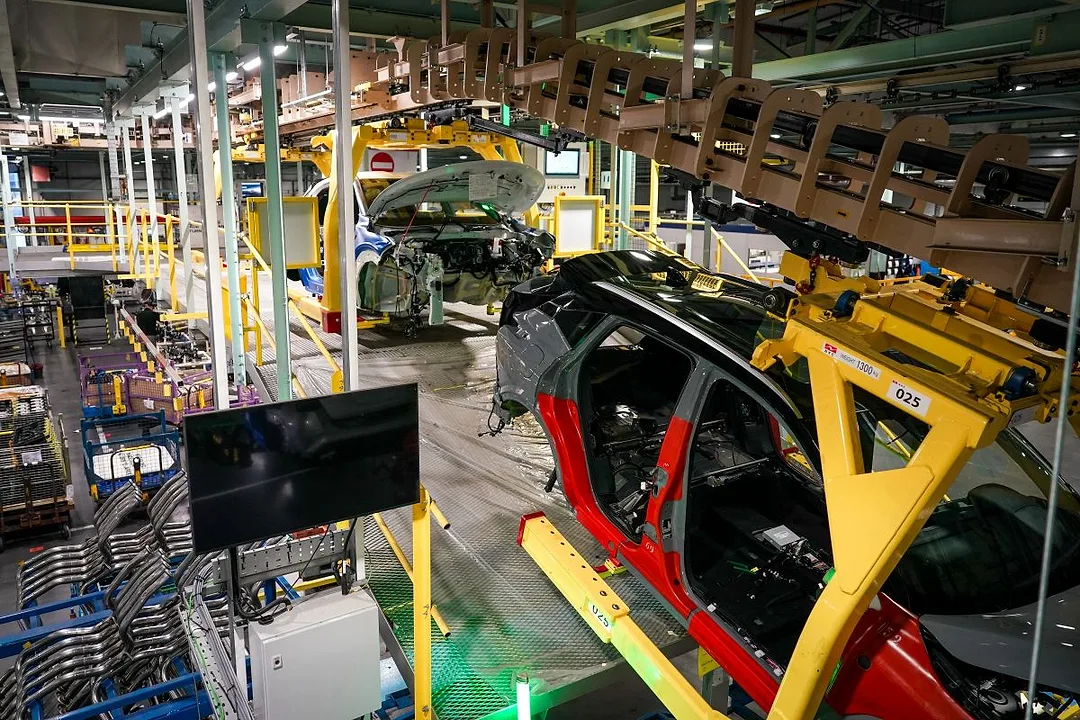 THE COMPLEX INTERIOR OF AN AUTO MANUFACTURING PLANT