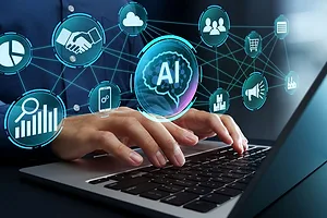 Businessman using AI agent system on laptop computer.