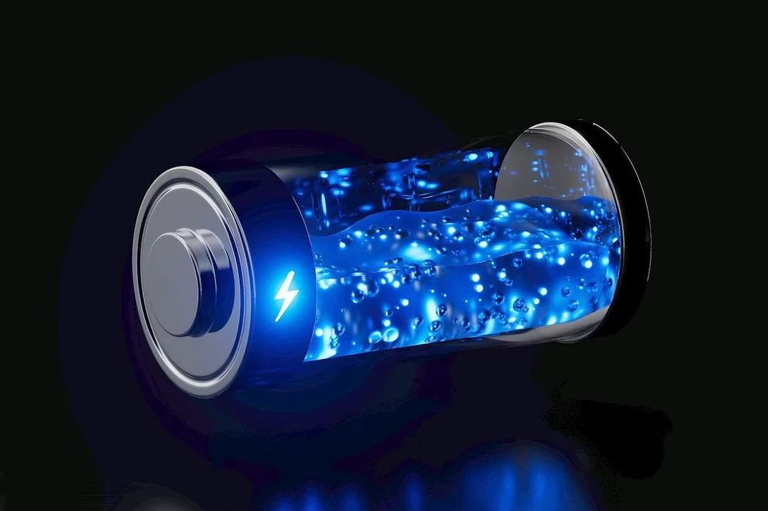 A GRAPHIC OF A TRANSPARENT BATTERY WITH A BRIGHTLY LIT BLUE LIQUID CENTER