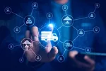 DIGITAL FREIGHT MARKETPLACE TRUCK iStock-Suriya Phosri-2227640973.jpg A businessman interacts with a digital ecosystem of truck freight, warehousing, and e-commerce,
