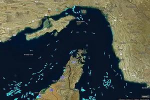 A MAP OF THE STRAIT OF HORMUZ SHOWING DOZENS OF BLUE DOTS DISTRIBUTED THROUGHOUT THE WATERWAY