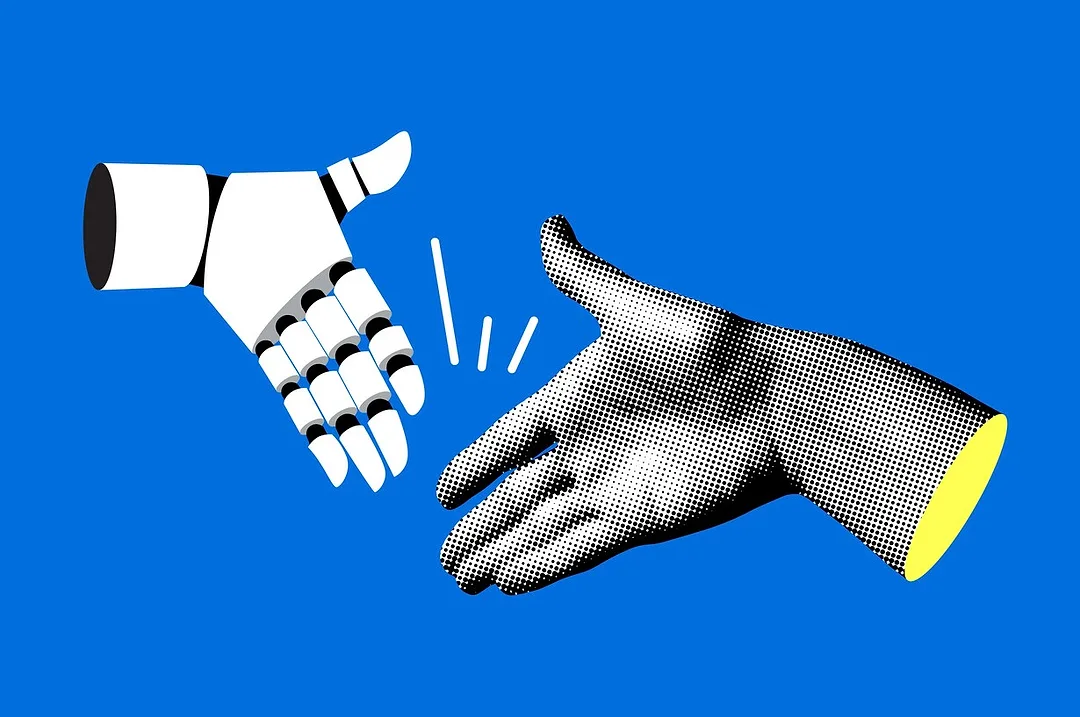 A ROBOTIC HAND AND A HUMAN HAND REACH TOWARD EACH OTHER FOR A HANDSHAKE