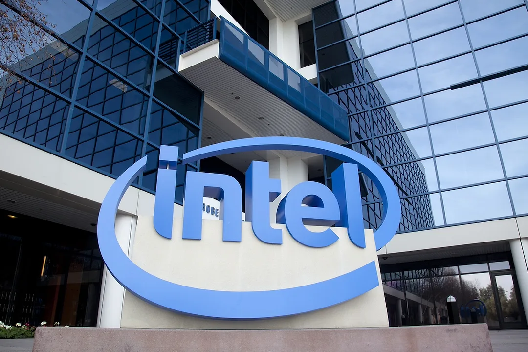 The base of an office building, with a large sign that reads "INTEL" directly outside