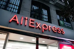 A windowed storefront that reads "ALI EXPRESS" in red letter across the top of the entrance