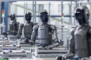 Autonomous AI Powered General Purpose Humanoid Robots Stand in a Row and Work at Factory on Assembly Line