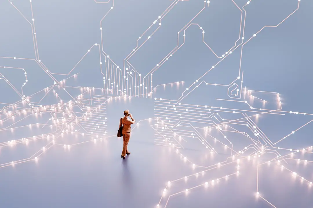 A businesswoman on the phone walking in a VR environment of bright lines of data