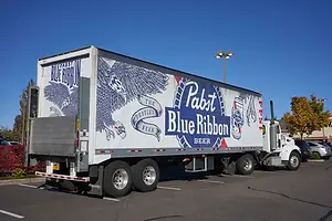 AN 18-WHEELER TRUCK BEARS THE PABST BLUE RIBBON LOGO