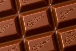 A CLOSE UP OF A CADBURY MILK CHOCOLATE BAR