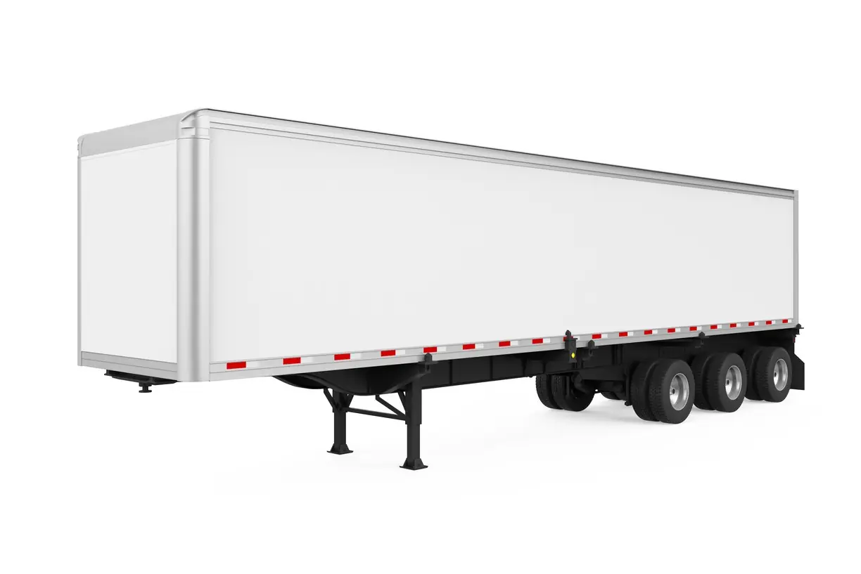 A WHITE SEMI TRUCK TRAILER SITS ON A TRUCK CHASSIS